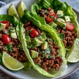Low carb Turkey Taco Lettuce Wraps featuring seasoned meat in crisp, refreshing leaves.